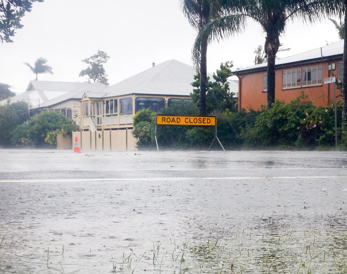 Flooded Brisbane street - raised floor homes may be classed as flood proof homes