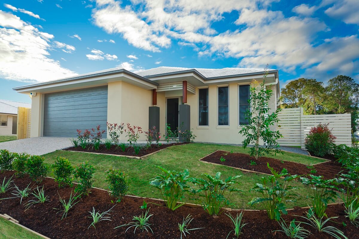 Cream brick lowset suburban new build home - Heathwood homes for sale are dominated by new builds - a building inspection is a must.
